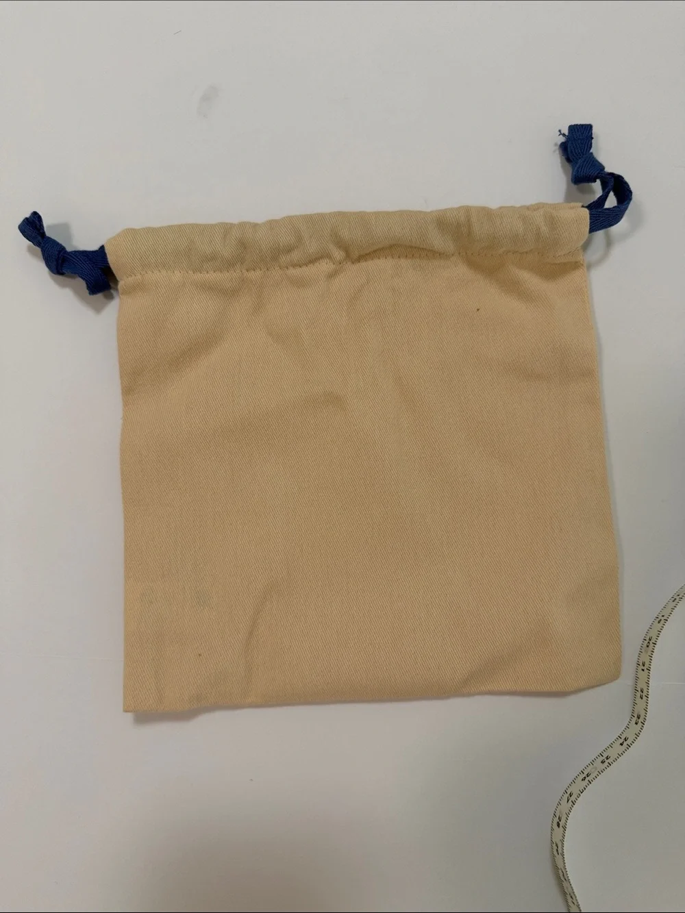 Louis Vuitton Beige Pouch with Blue Drawstrings